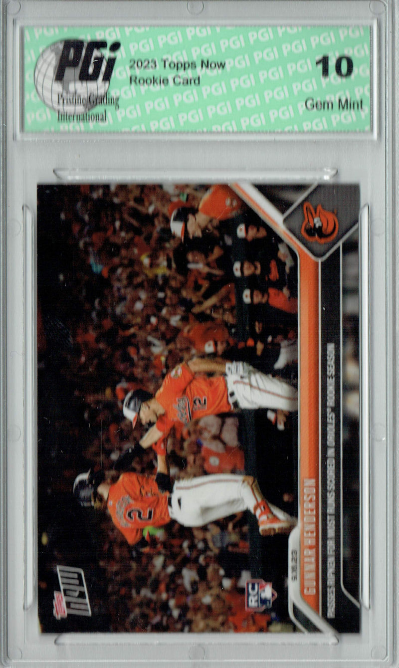Gunnar Henderson 2023 Topps Now #875 Passes Cal Ripken Rookie Card PGI 10